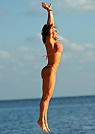 alicia in a malibu strings bikini