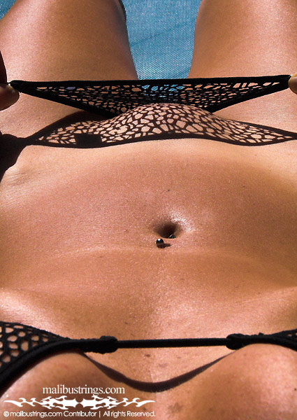 Stacie in a Malibu Strings bikini in Cancun.