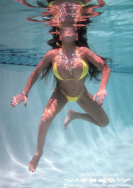 Alicia in a Malibu Strings bikini in the Pool.
