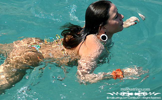 Alicia in a Malibu Strings bikini on the boat in Florida.