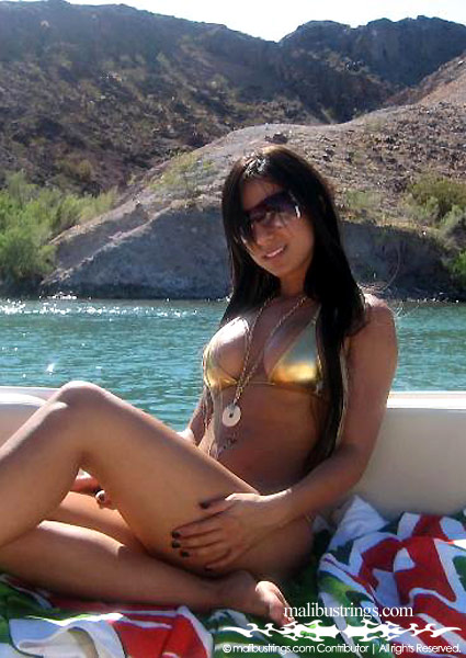 Casandra in a Malibu Strings bikini in Lake Havazu, Arizona.