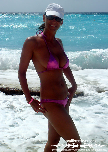 Elizabeth in a Malibu Strings bikini on the beach in Cancun.