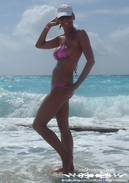 Elizabeth in a Malibu Strings bikini on the beach in Cancun.