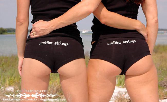 Laurie & Michelle in a Malibu Strings bikini in Florida.