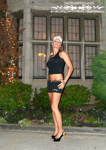 Lolo in a Malibu Strings bikini at the Playboy Mansion.