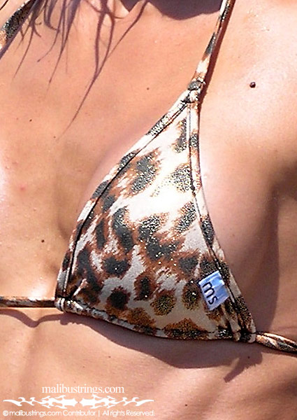 Monica in a Malibu Strings bikini in Ibiza.
