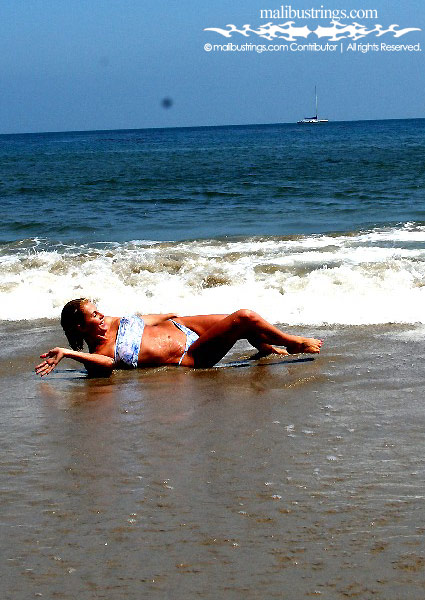 Jeni in a Malibu Strings bikini in Huntington Beach.