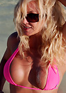 mo in a malibu strings bikini