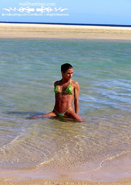 Monica in a Malibu Strings bikini in Canary Islands.